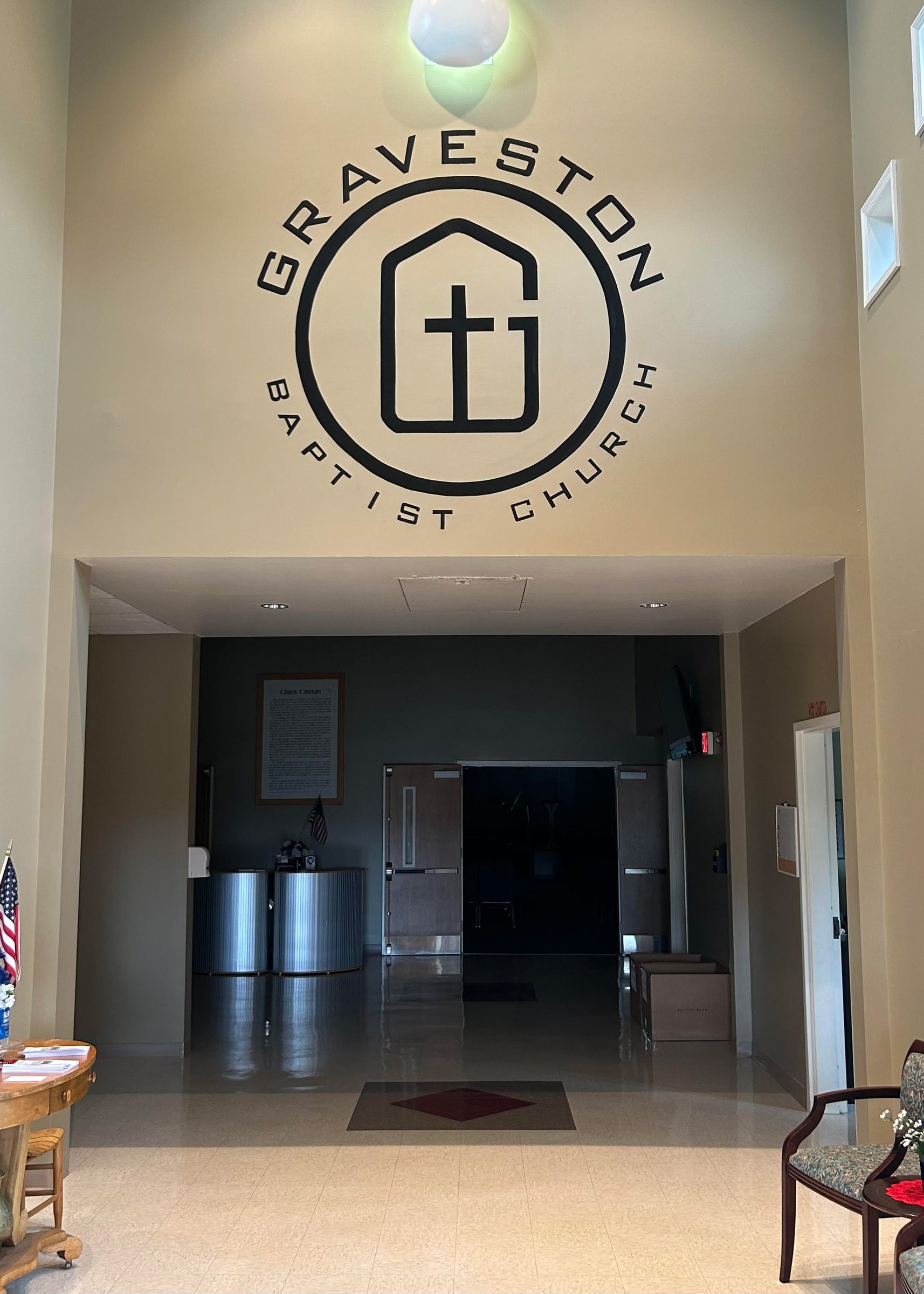 Graveston Baptist Church logo mural painted above the lobby doors